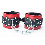 <strong>Красные наручники с чёрными проклёпанными ремешками с пряжкой </strong> <br />
Красные наручники с чёрными проклёпанными ремешками с пряжкой. <div class="charTableblock"><div><span>Материал</span>: кожа</div><div><span>Цвет</span>: черный; красный, розовый</div><div><span>Производитель</span>: БДСМ арсенал, Россия</div></div> Красные наручники с чёрными проклёпанными ремешками с пряжкой
Красные наручники с чёрными проклёпанными ремешками с пряжкой.