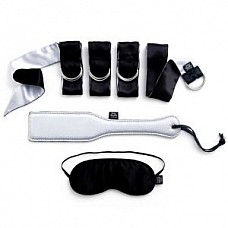 <strong>Набор фетиш-аксессуаров First Time Bondage Kit</strong> <br />
Узнайте больше о своей чувственности, воспользовавшись комплектом бондажа для новичков. Наденьте на глаза партнёра специальную повязку, так вы усилите его восприимчивость, свяжите запястья вместе при помощи мягких атласных манжет. Отшлёпайте партнёра, ожидающего нежных ударов.
<br><br>В наборе:
<br> - маска на глаза;
<br> - шлепалка с атласным покрытием с одной стороны и с кожаным с другой;
<br> - 4 атласные ленты-фиксатора, на каждой металлическая фурнитура для закрепления концов.
<br><br>В комплект входит атласный мешочек для хранения.<div class="charTableblock"><div><span>Производитель</span>: Fifty Shades of Grey, Великобритания</div></div> Набор фетиш-аксессуаров First Time Bondage Kit
Узнайте больше о своей чувственности, воспользовавшись комплектом бондажа для новичков. Наденьте на глаза партнёра специальную повязку, так вы усилите его восприимчивость, свяжите запястья вместе при помощи мягких атласных манжет. Отшлёпайте партнёра, ожидающего нежных ударов.
<br><br>В наборе:
<br> - маска на глаза;
<br> - шлепалка с атласным покрытием с одной стороны и с кожаным с другой;
<br> - 4 атласные ленты-фиксатора, на каждой металлическая фурнитура для закрепления концов.
<br><br>В комплект входит атласный мешочек для хранения.